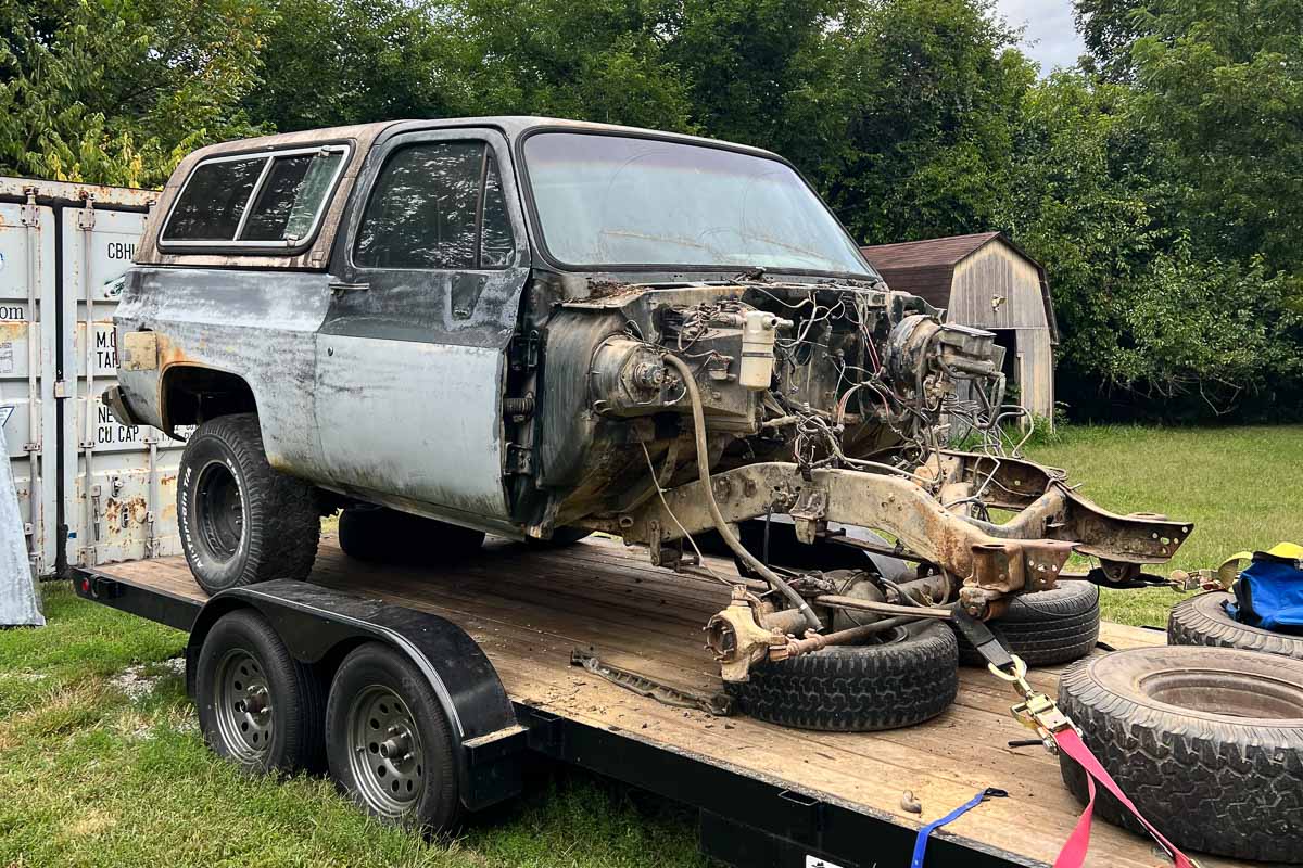 Before photo of the rusted 1990 Blazer body, showing its original condition.