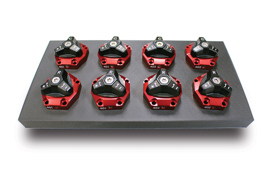 QA1 MOD series shocks with modular QuickTune valve packs allow easy customization of suspension stiffness without disassembly for drag racing, road course, and street performance.