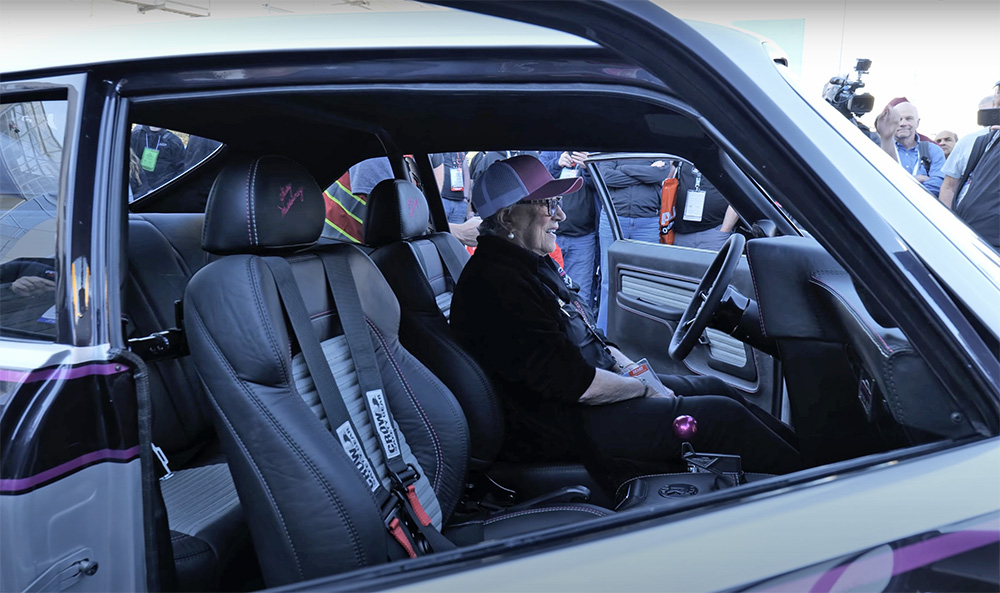 Drag racing legend Shirley Muldowney takes in the first completed Cha Cha Nova at the 2024 SEMA Show.